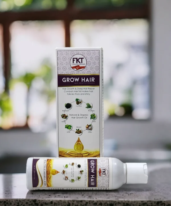 FKT Grow Hair Oil bottle featuring a blend of essential oils for hair growth, including Amla, Bhringraj, and Black Seed, designed to reduce hair fall and enhance scalp health by Dr Grow Care.